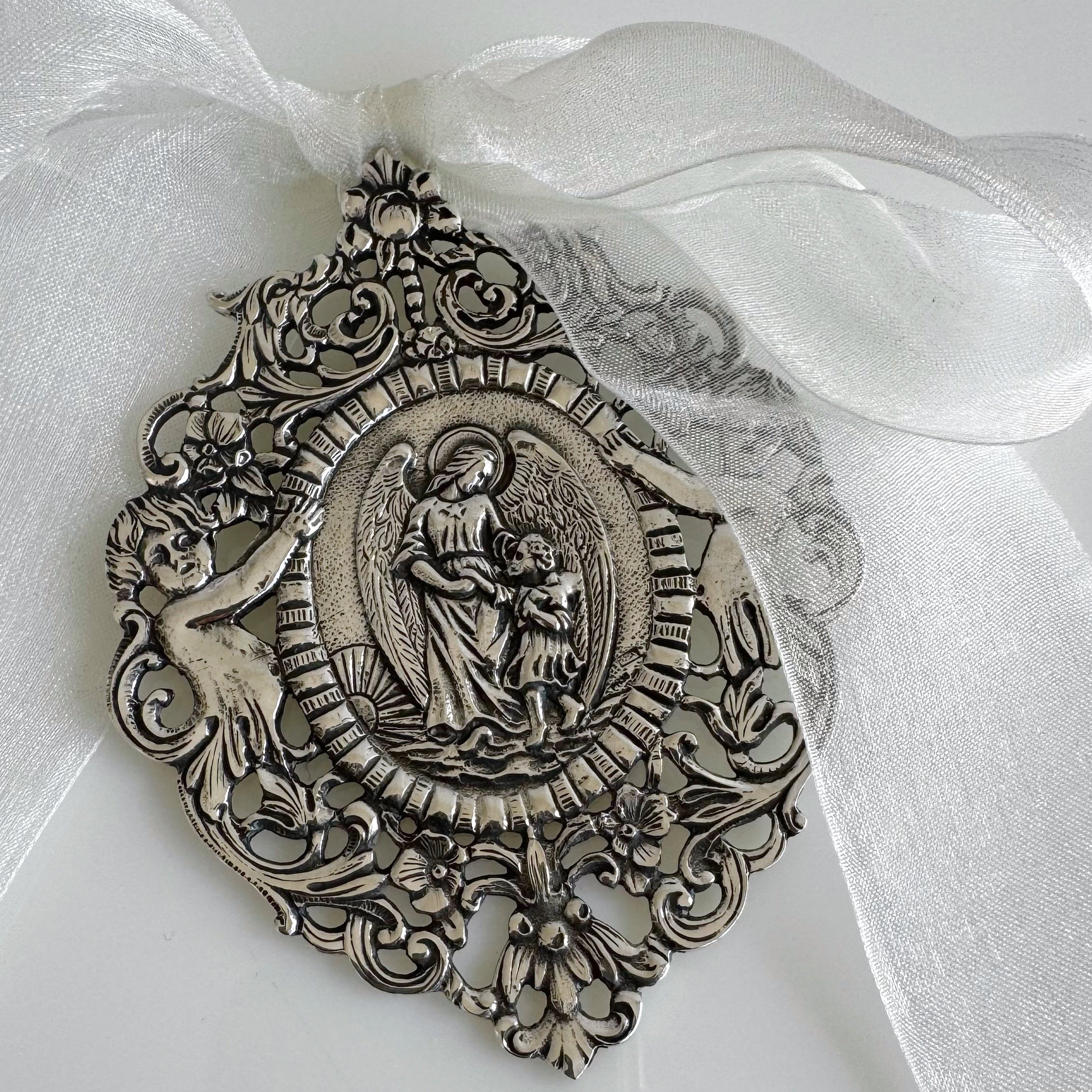 CUNERO ANGEL DE LA GUARDA OVALADO